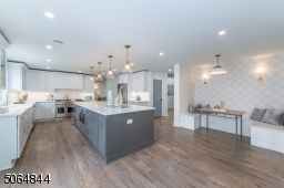 Loads of cabinets, walk in pantry and cozy comfortable sit down eating nook