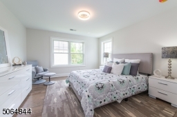 One of 4/5 bedrooms on second floor. This bedroom has its own ensuite full bath (not shown)