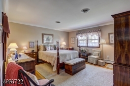Master Bedroom is 14'.6" x 14'.8" with a 7'.4" x 4'.6" walk-in closet. Oak flooring.