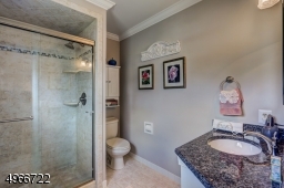 Master shower is 48" x 32 ". Newer  exquisite sliding barn bathroom door.