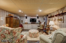 Located at recreation room area. Also,full finished basement has  bonus room 11'. 7"x13', utility room 21' x 19.6" w/workshop & walkout bilco doors installed in 2003, and extra closets, cedar 2'.8" x &' additional storage 2'.8" x 7 with wire shelves.