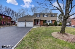 Lot size 100 x 244. Two car wide belgium block driveway, 20 ' x 20' two car attached garage w/insulated doors, epoxy flooring, pull down stairs leads to loft area ideal for extra storage and side door leads to walkway with pavers.