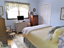 Second bedroom is 11'.4" x 12' x 12.4". Oak wood flooring.
