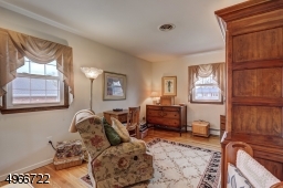 Third Bedroom is 12'.3" x 11.9". Oak wood flooring.