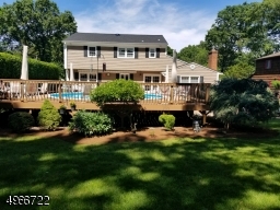 Great for entertaining. This two tier trex wood deck is 32" x 45' with above ground pool in upper deck, electric awning in lower deck and deck lighting,