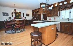 Hardwood floors, pantry, access to laundry room.