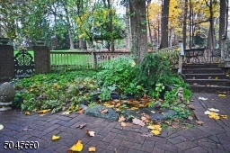 with garden pond and brick patio, this private area i a lovely spot for an outdoor meal.