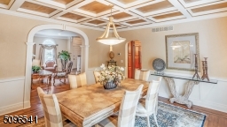 Another view of the dining room looking into the living room.  Notice the arched doorway detailing.