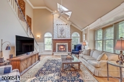 Soaring ceilings lots of windows and skylights, yet still a cozy room to relax in.