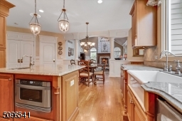 Gourmet kitchen. This room needs to be seen! All of the bells and whistles! 6 Burner Viking stove; Farm sink; 2nd sink; even a Kitchen Aid dishwasher!