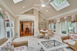 Great flow, open to the kitchen and doors to the blue stone patio.