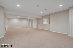 Large open finished space, recently painted with a full bathroom.