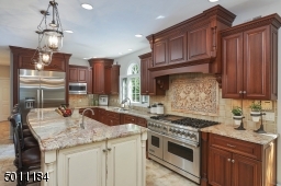 Ejoy the "chef's" Viking stove and oven, all top of the line SS appliances were used in this kitchen.