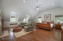 2 LARGE master walk-in closets, peek-a-boo fireplace to the master sitting area and just so spacious, soaring ceilings and new hardwood floors!