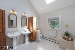 So much space in this master bathroom. Skylights and soaring ceilings.