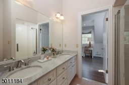 Isn't this just perfect? white cabinetry with gray and white marble top.