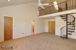 Large and Bright with New Carpeting! View of Loft.
