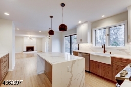 Waterfall island, countertops and backsplash all in quartz!