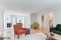 View from Living room into dining room and stairs