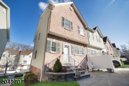 Beautiful End-unit Multi-level 2 Bedroom Townhome with a Master Bedroom Suite and 3.1 Baths. Spacious Home Office/Exercise/Studio on the Ground Level. Attached, Direct Access Garage  Nice Location, Convenient to NYC Transportation.