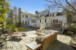 Bring the party outside on the wood decks both leading to the bluestone patio.
