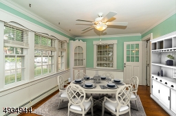 Dining room with built-ins (virtually staged)