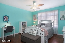 one of three additional bedrooms, full bathroom, and laundry room on 2nd floor