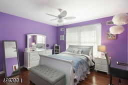 one of three additional bedrooms, full bathroom, and laundry room on 2nd floor