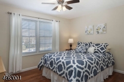 one of three additional bedrooms, full bathroom, and laundry room on 2nd floor