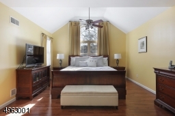 Magnificent master suite with cathedral ceilings and two walk in closets.