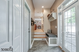 Heated Floor with Direct Access to Garage & Patio.