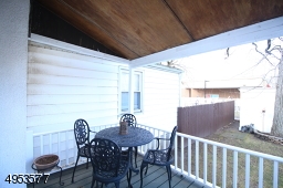 Enjoy outdoor dining on your covered back porch