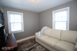 Second Bedroom, currently being used as Den; windows on 2 exposures; hardwood floor, closet