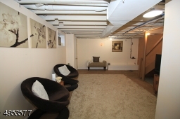 Another view of basement area being used as 'rec room'.
