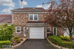 Attached garage with garage door opener.