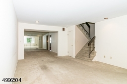 Spacious living room with picture window.