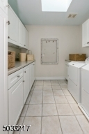 2nd floor Large Laundry with  sink and plentiful storage