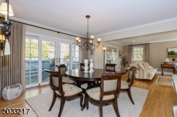 Sliding French door opens to IPE deck which connects to kitchen