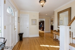 Gracious entryway with hardwood floors