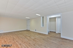Basement Rec Room, Two Storage Room, Leads to Backyard