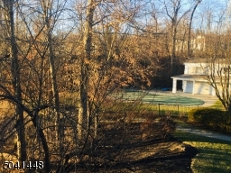 Situated near the community pool, this convenient location is ideal for enjoying summer fun!
