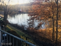 Spectacular, seasonal pond views from the balcony of the turnkey townhome!