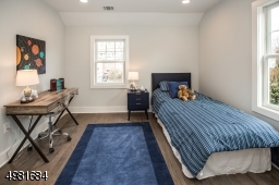 Spacious additional bedroom on the second level.