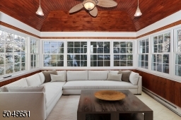 3 walls of windows, options for room could be home office, exercise room, etc...