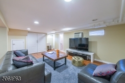 The finished lower level offers plenty of space for a gathering, game or media room. A fifth bedroom and full bath complete the level.