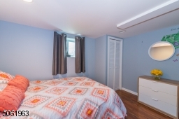 The finished lower level offers plenty of space for a gathering, game or media room. A fifth bedroom and full bath complete the level.