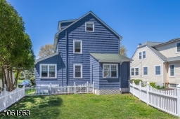 This fenced in lush yard make play (and doggy) dates worry free.