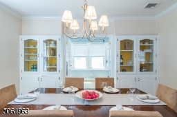 Beautiful hardwood floors and a soothing color palette are blended perfectly in the delightful dining room that flows seamlessly to the kitchen and living room for easy entertaining.