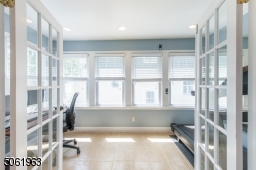 Sitting off of the dining room, this sundrenched office is the perfect space to unleash your creativity.