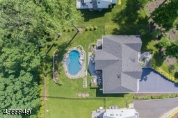 Plenty of green space plus lovely patio and pool.  Suburban Oasis!